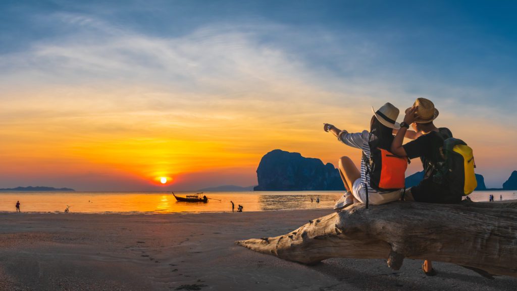 Romantic couple traveler joy look beautiful nature at sunset Pak
